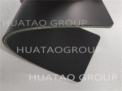 Cinturón de prensado para comprimir previamente la fibra de madera extendida o las virutas en la fabricación de paneles de madera.